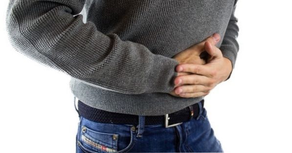 What is gastric ulcer and what are the symptoms?